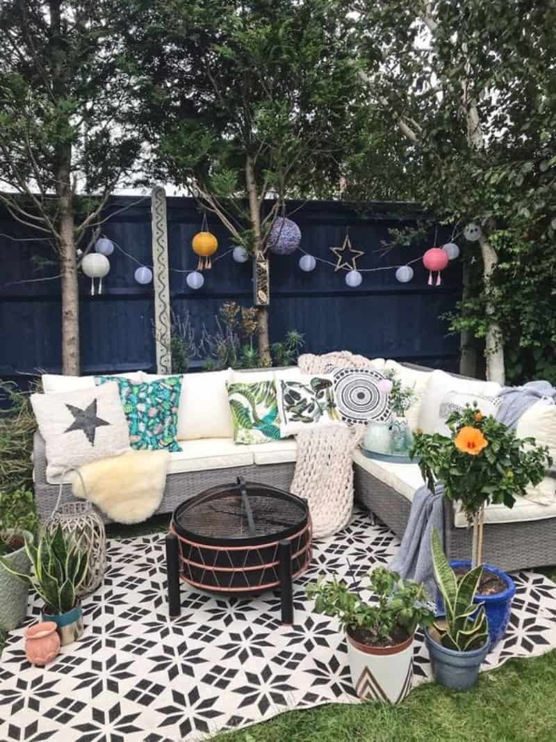 Spring garden vibe with an outdoor rug under the seating area