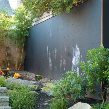 Chalkboard wall attached to a garden wall