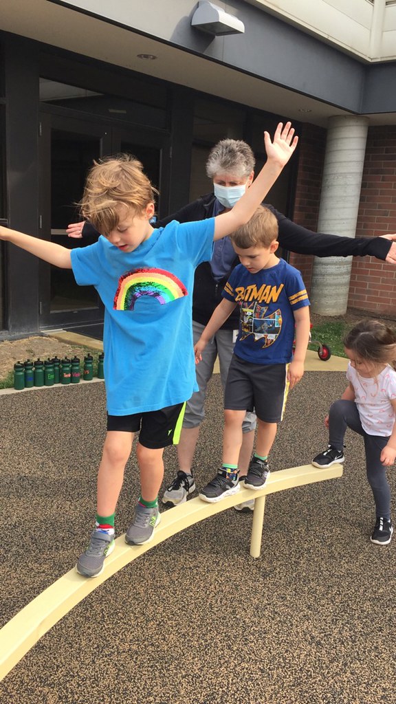 Kids on a balance beam