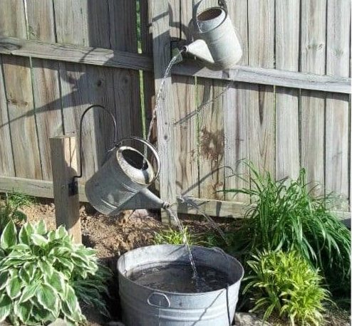 Old watering cans