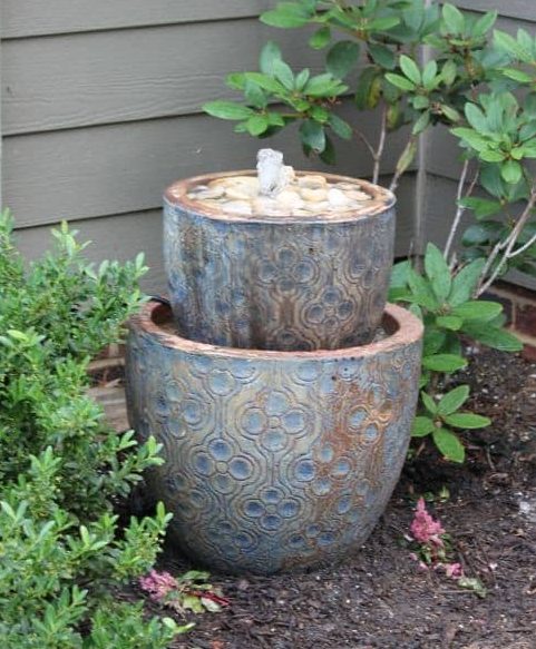 Carved rustic fountain