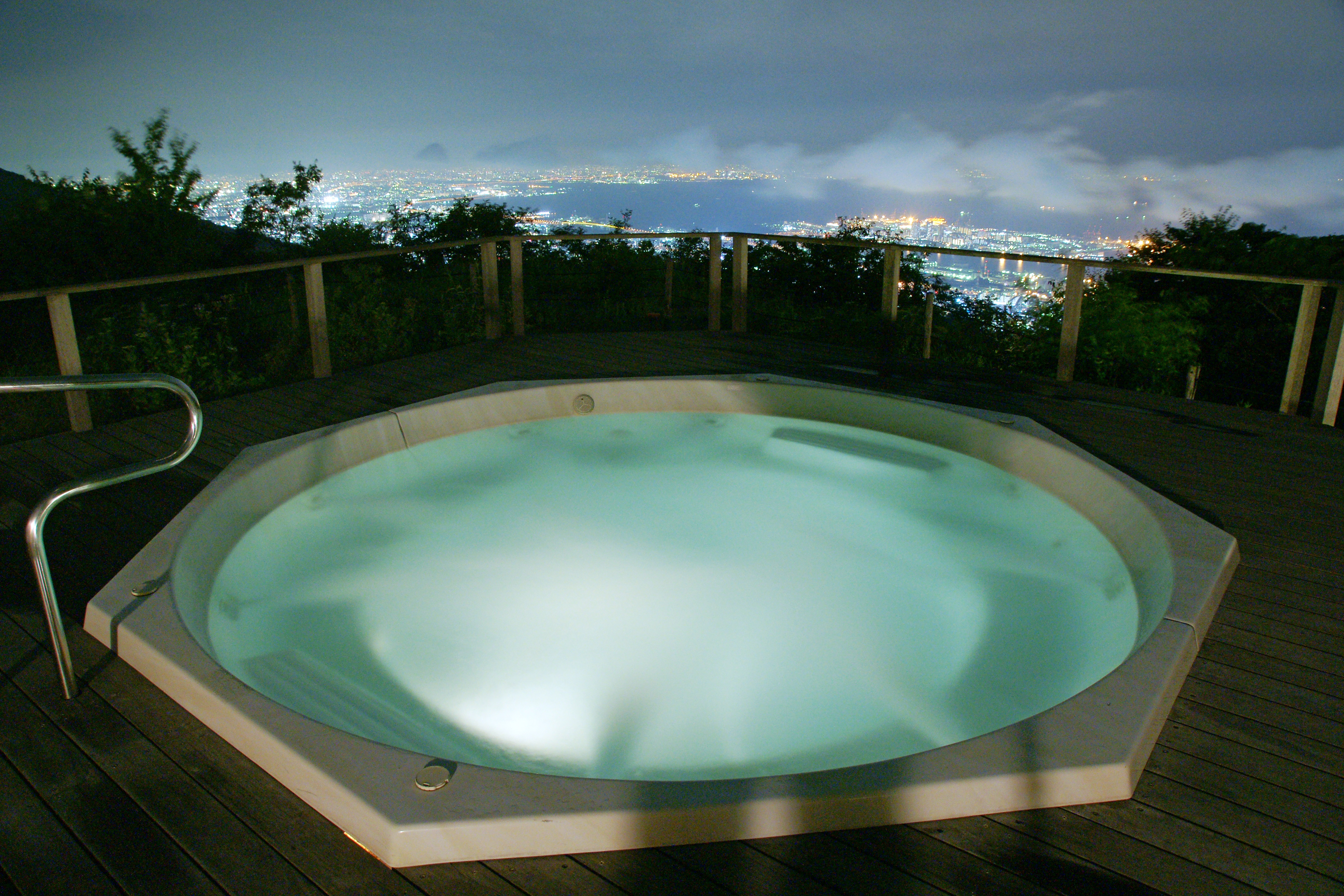In-ground rooftop hot tub on deck