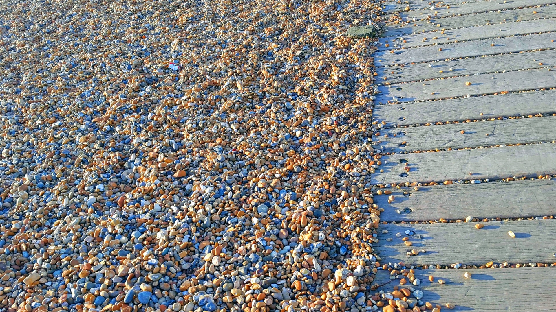 Beach pebble and timber path