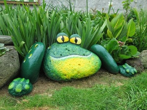 Painted rock sculpture, a frog