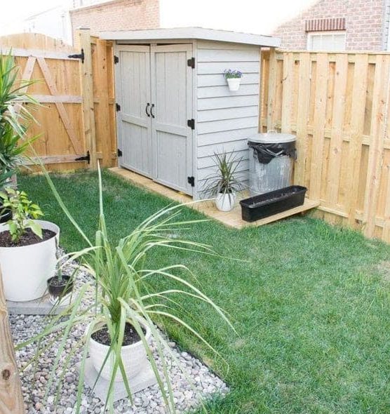 A mini backyard with small corner shed