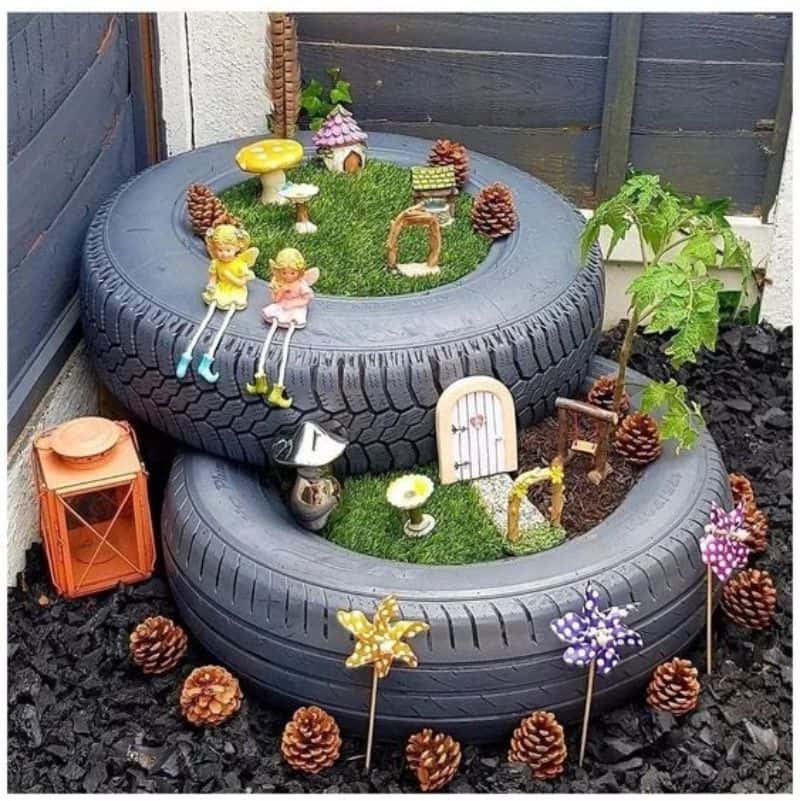 Mini fairy garden in recycled tyre