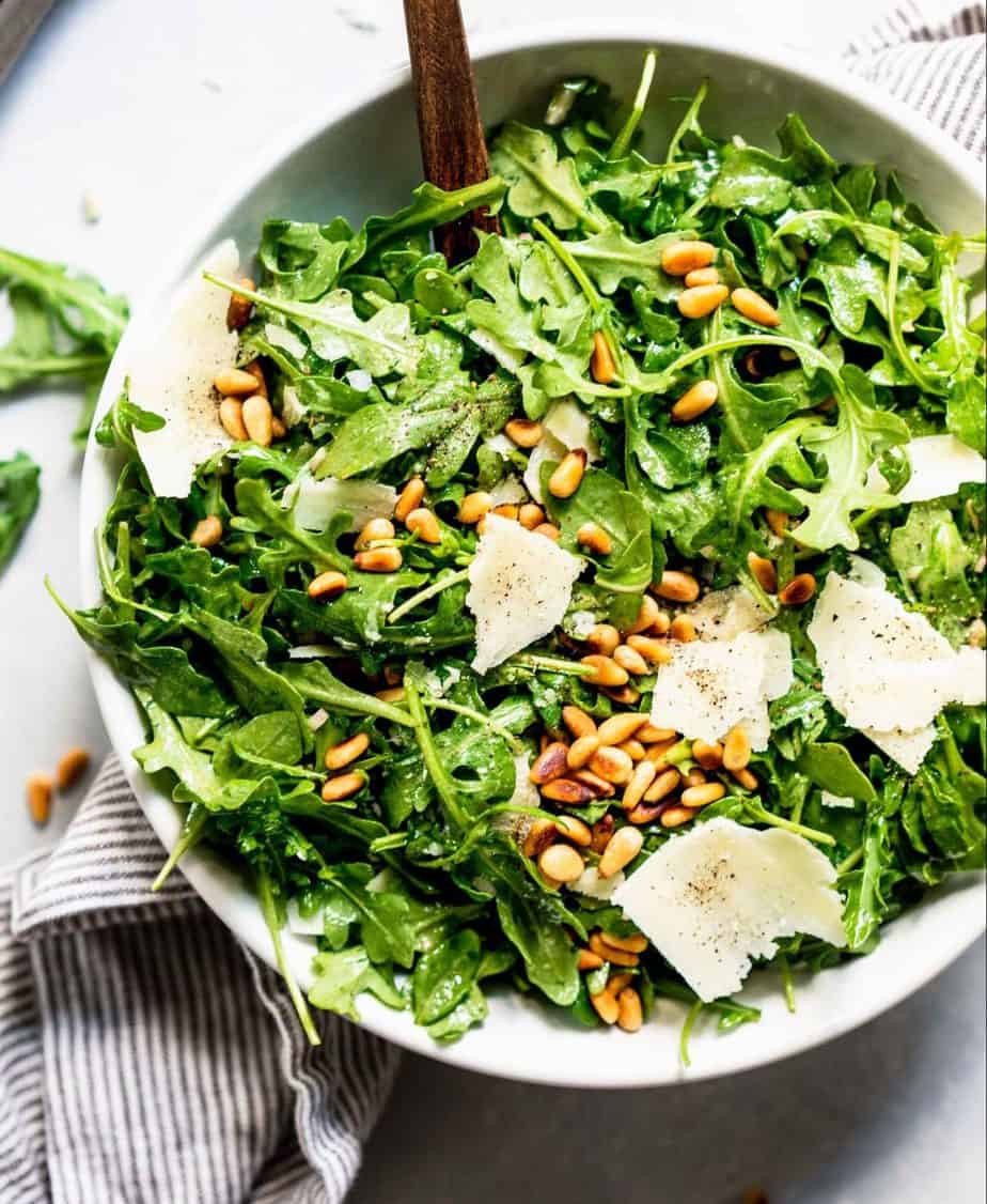 Rocket salad with dried sunflower seeds and cheese