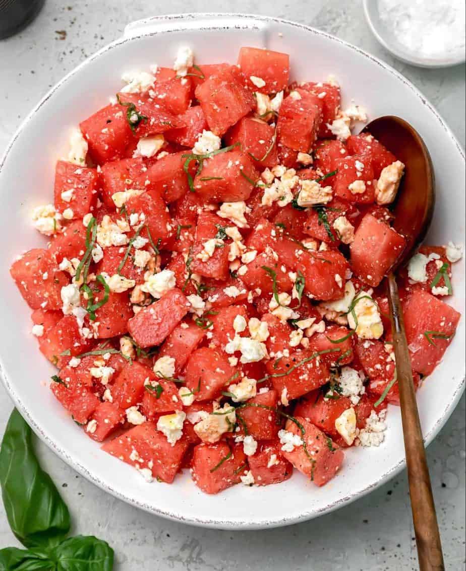 A bowl of watermelon salad with feta cheese