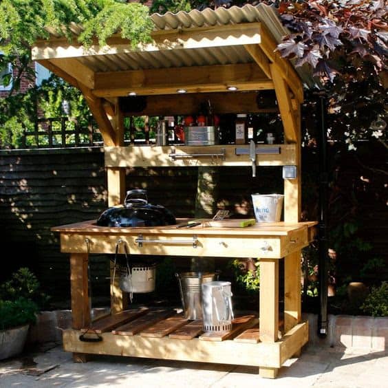Custom-built BBQ station with table made from timber