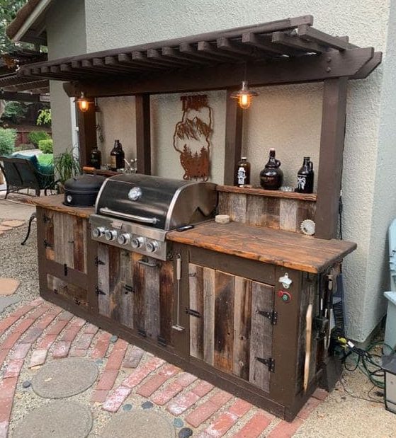 Rustic BBQ wall setup with dark wood