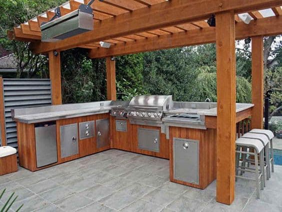 Huge BBQ area setup with brown and silver tones