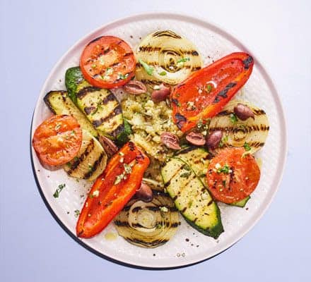Griddled vegetables with melting aubergines in one plate