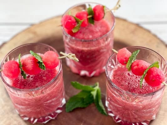 Small glasses of mixed watermelon and strawberry slush