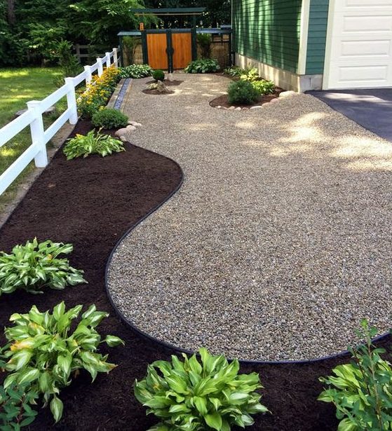 Pebble and dirt side yard