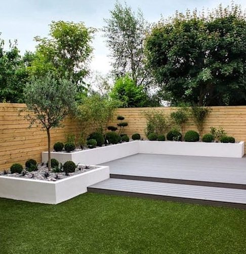 White deck and garden beds