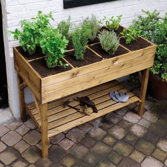 DIY raised garden bed with shelf and sections