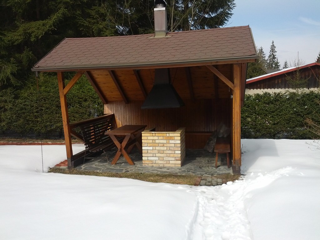 Cedar BBQ area with chimney