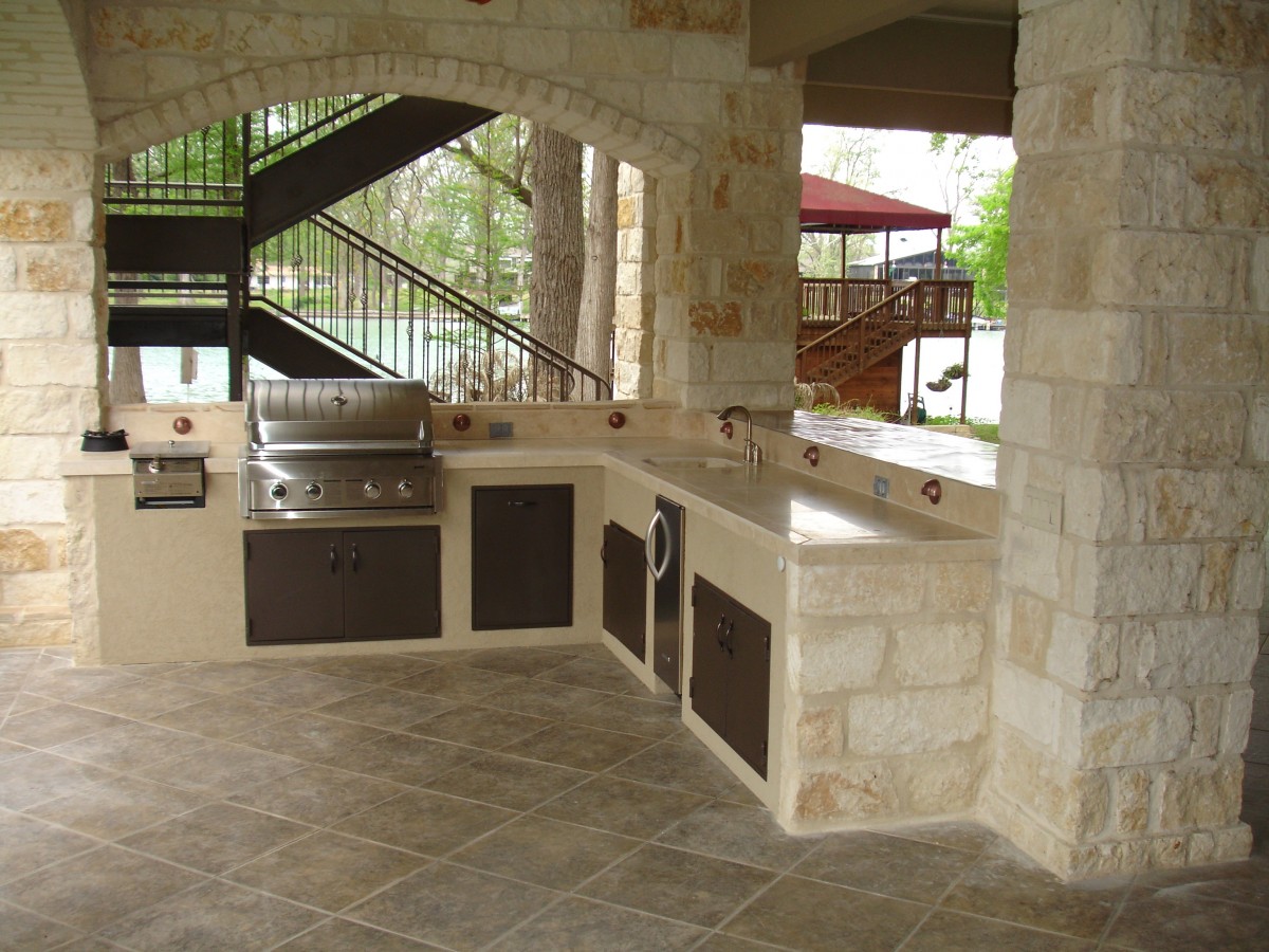 Stone outdoor kitchen with sink