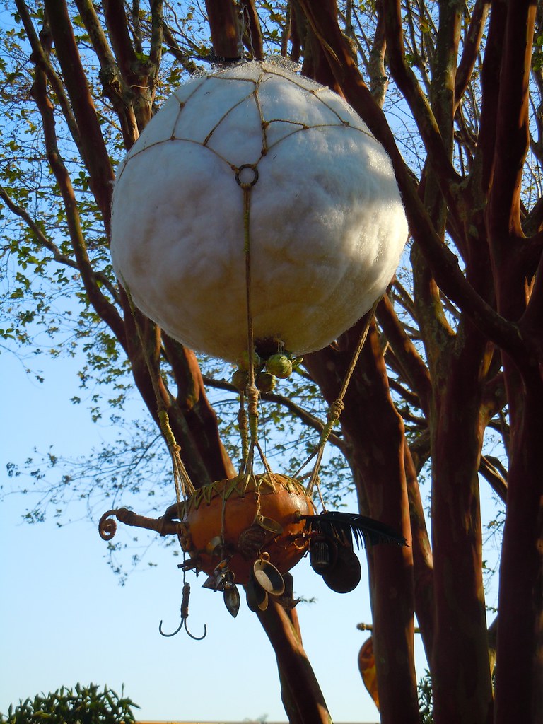 Tinkerbell's hot air balloon hung on a tree branch