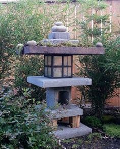 DIY garden pagoda made from leftover paving slabs and stones