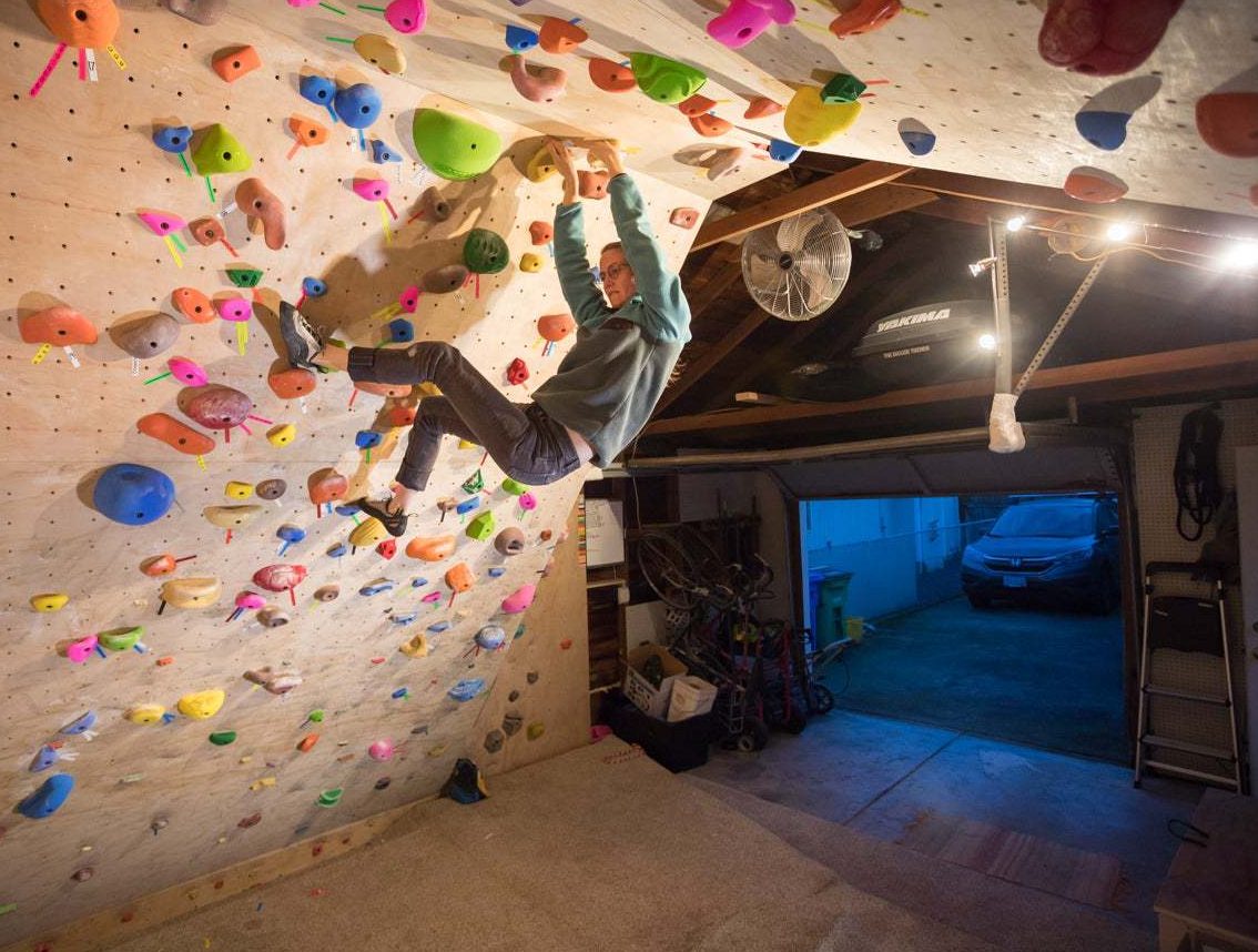 Garage gym with indoor wall climbing