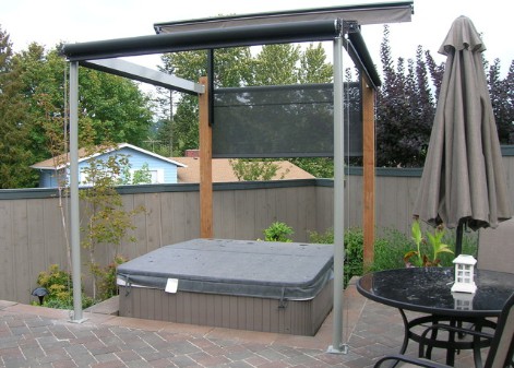 Outdoor hot tub with a canopy cover