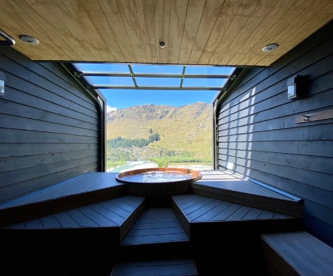 An open-space outdoor cabin hot tub