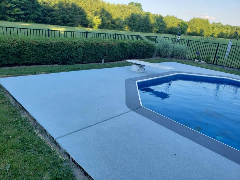 Concrete pool decking and lawn edging combination