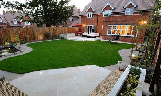 A satin finish teamed with a sleek wooden bench for a modern patio area