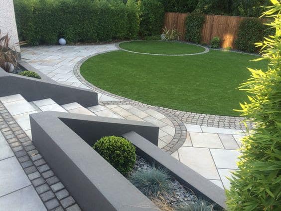 Curved shapes lawn, patio and flower beds