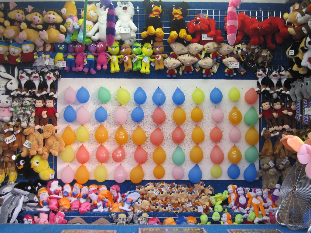 Carnival balloon dart board booth