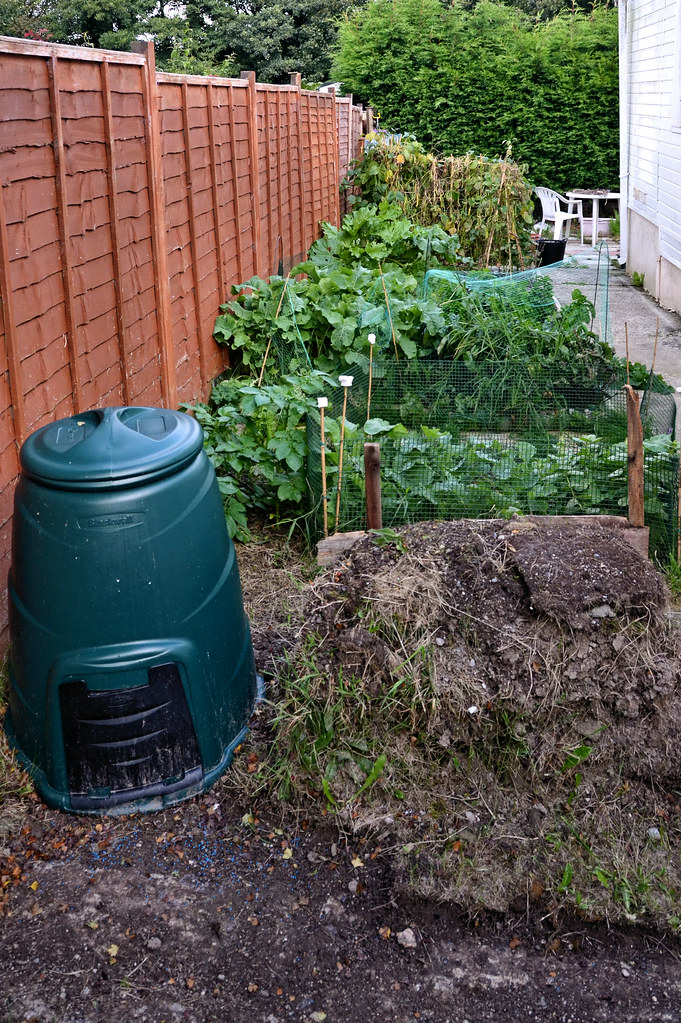 Side vegetable garden with compost bin