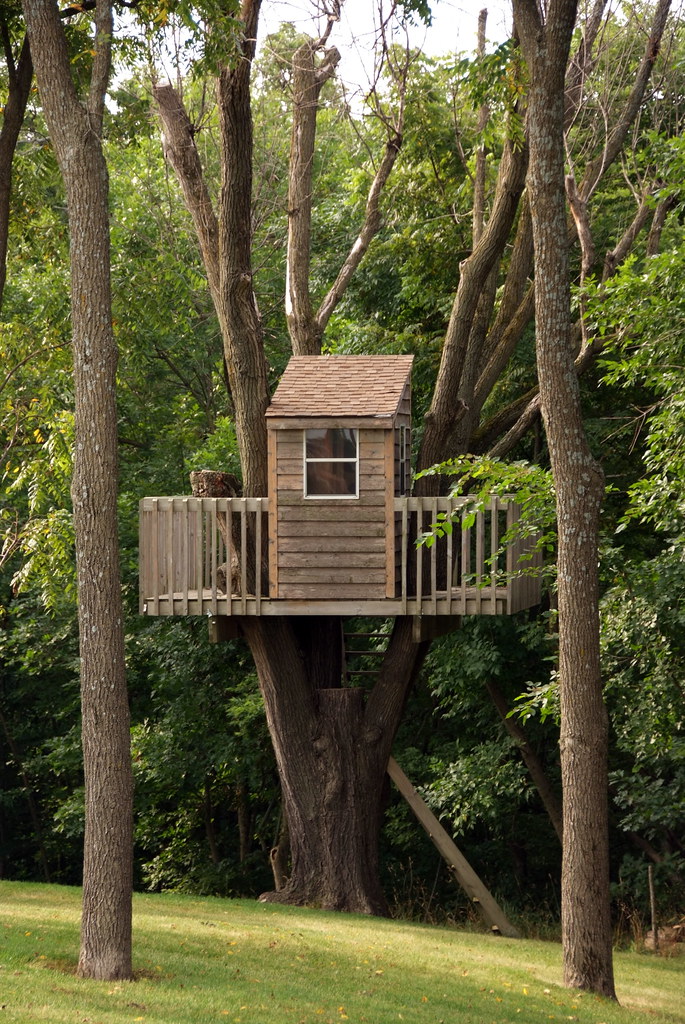 Small treehouse with a decked terrace