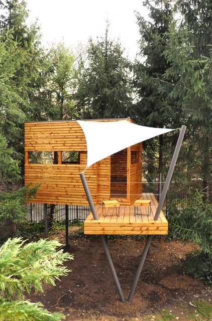 Modern treehouse design with sail shade