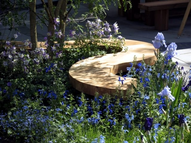 Spiral shaped wooden garden bench