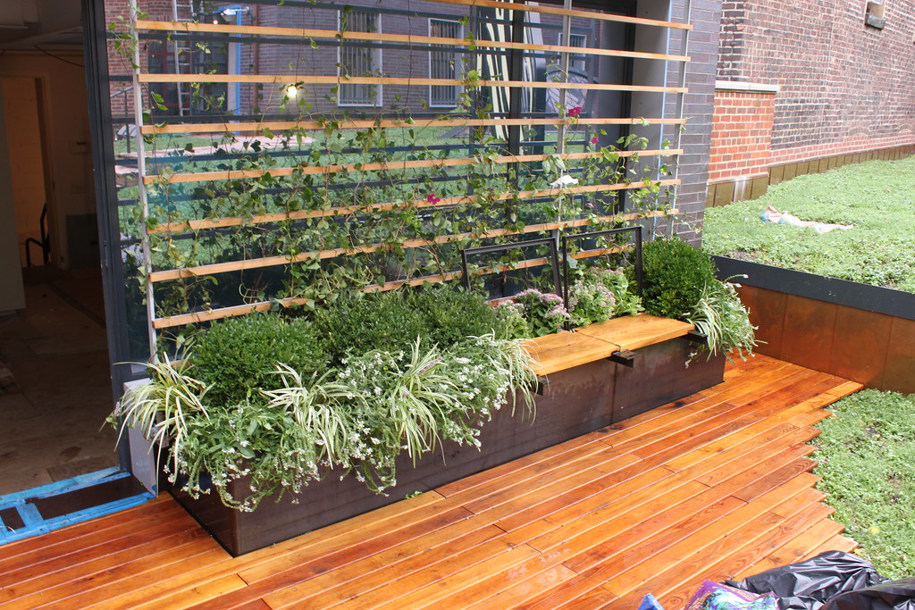 Bench planters with a trellis