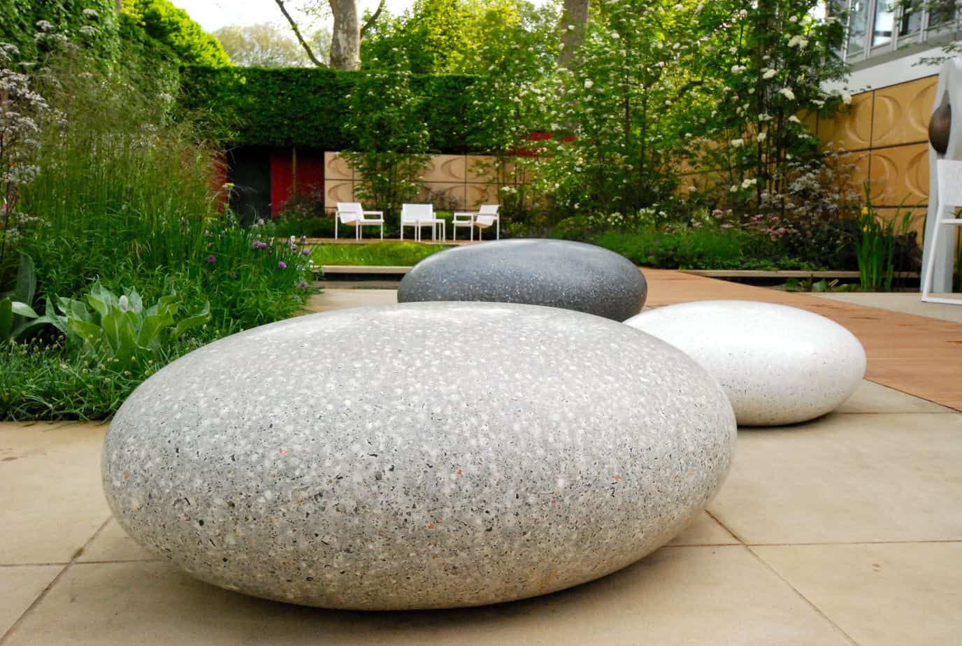 Stone pebble garden bench in oval shape
