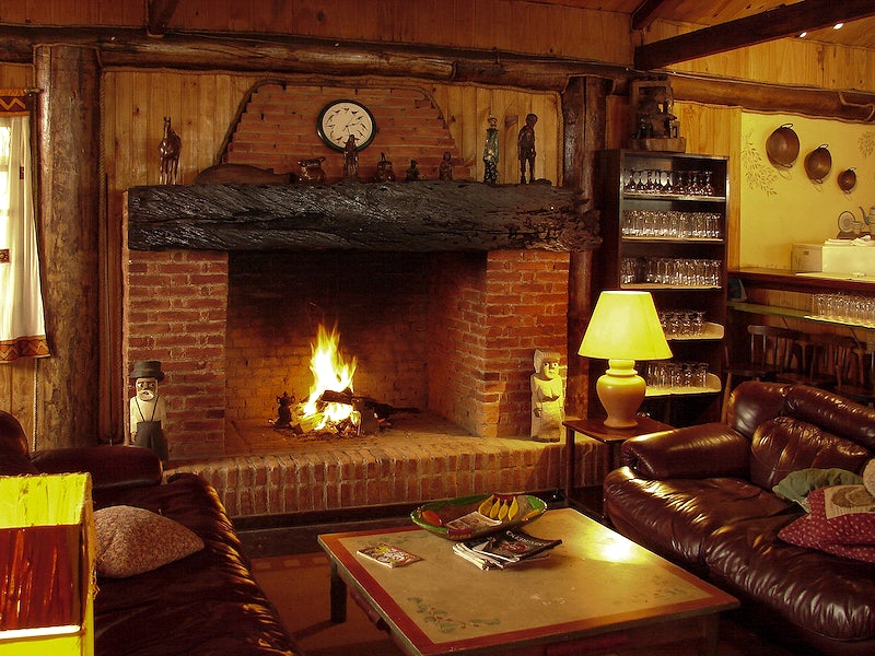 Cosy log cabin fireplace nook