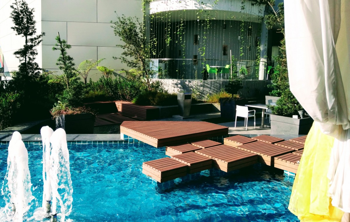 Backyard pool with composite decking