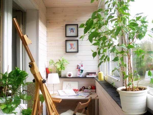 A lush working space in a balcony