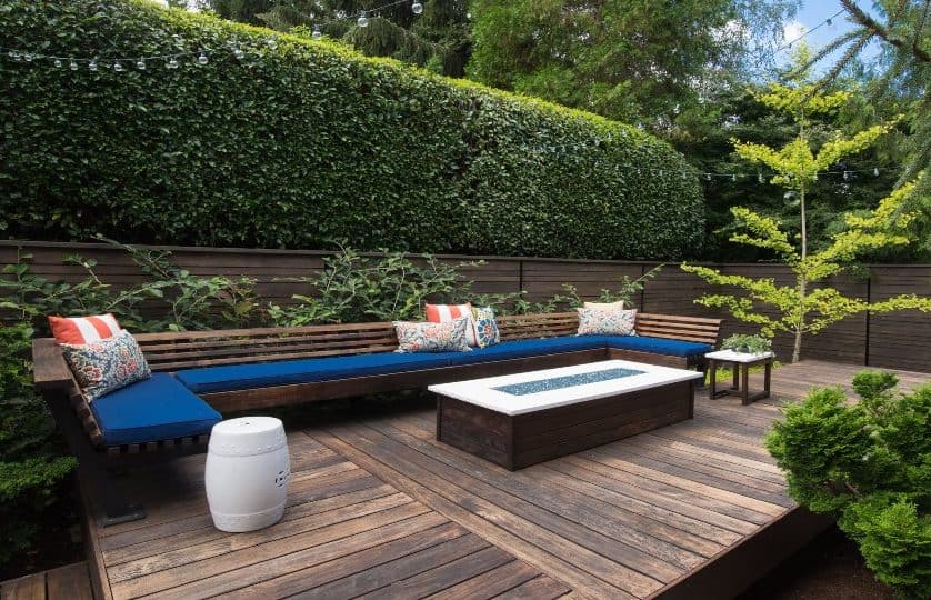Terrace garden with mixed wooden elements and greenery