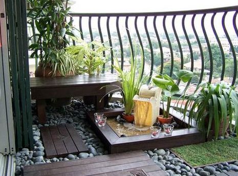 A small water features that adorns a tiny balcony space
