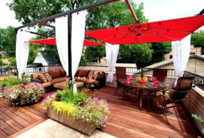 A stylish rooftop garden lounge with drapery