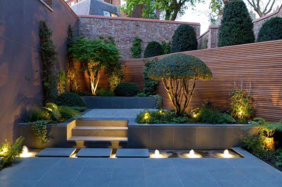 Modern landscaping with planters and grass on different levels