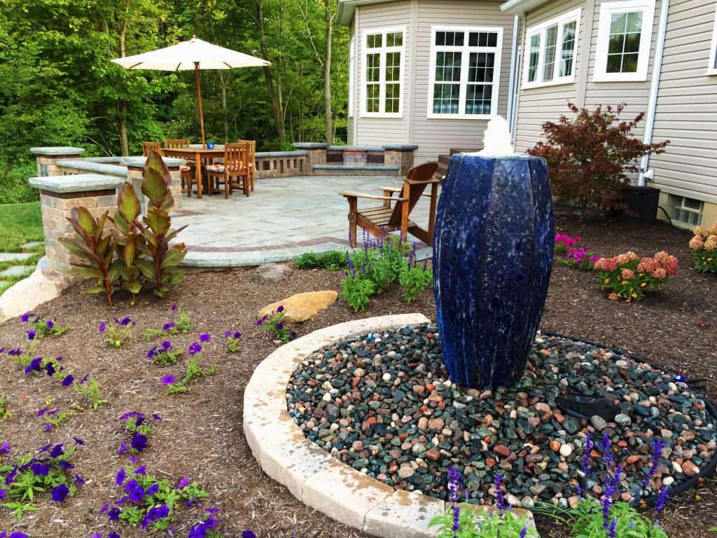 A stunning fountain that adds wonders to any front garden setting