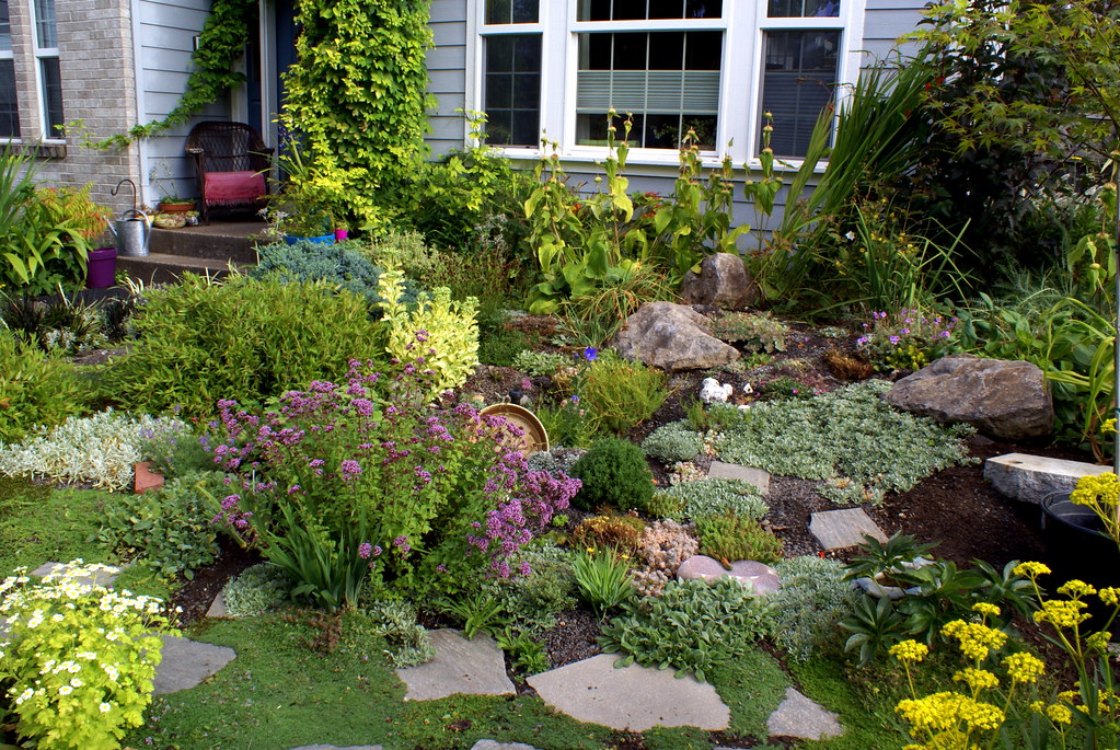 Rock garden in a front yard with greenery