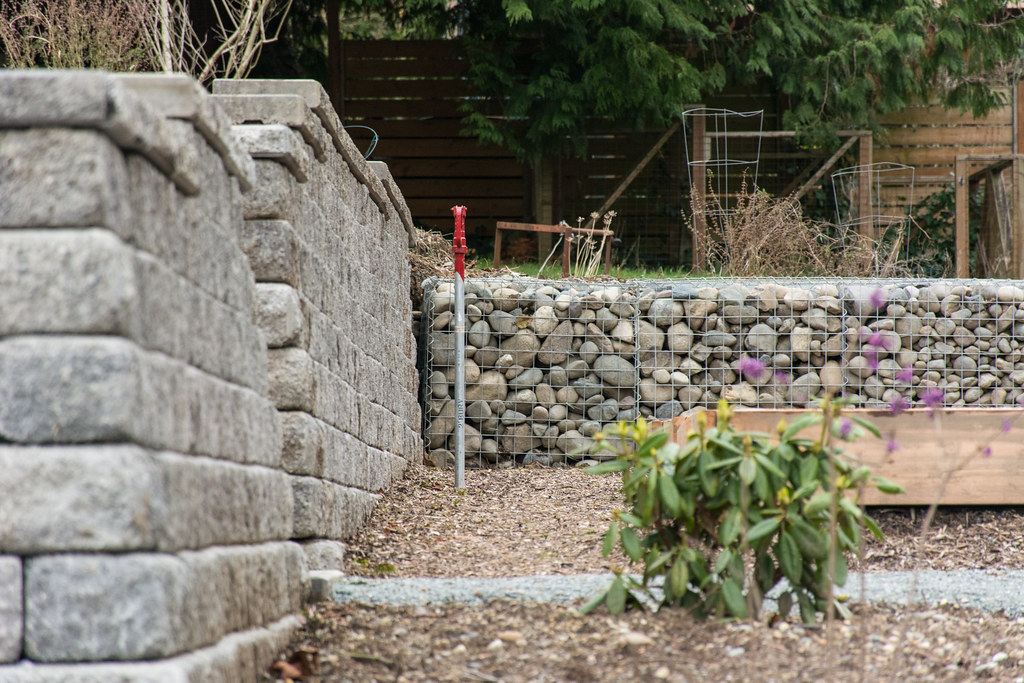 Gabion wall that doubles as edging