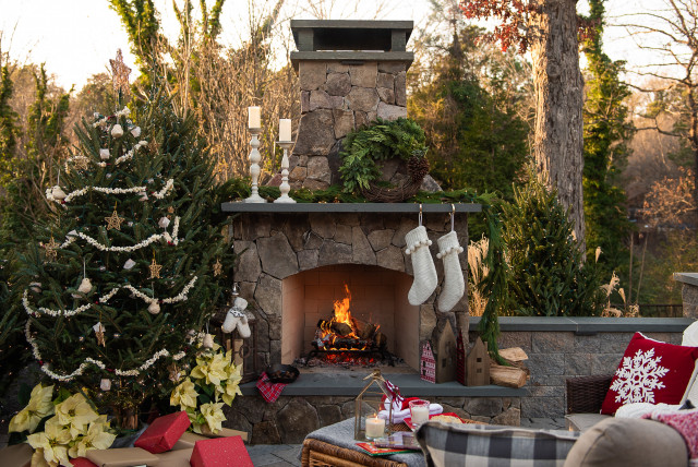 A merry outdoor fireplace mantel display