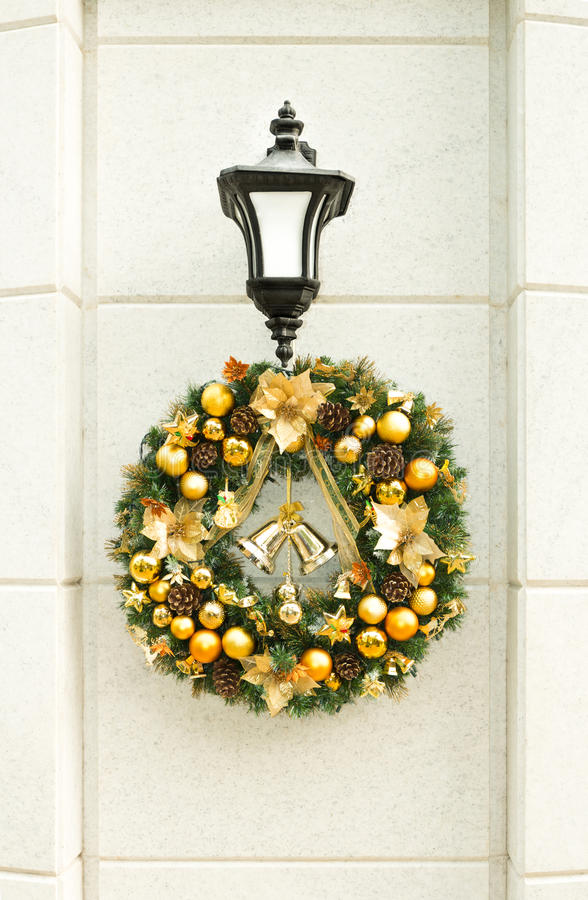 Wall lamp Christmas decor with a wreath