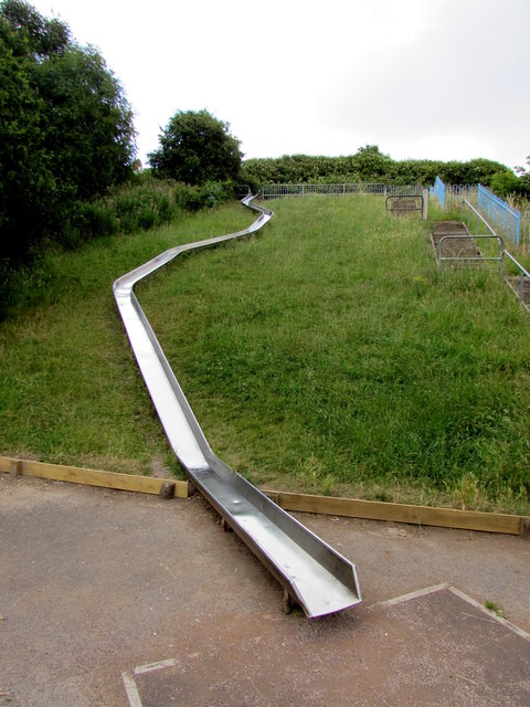 Giant slide on a sloped garden